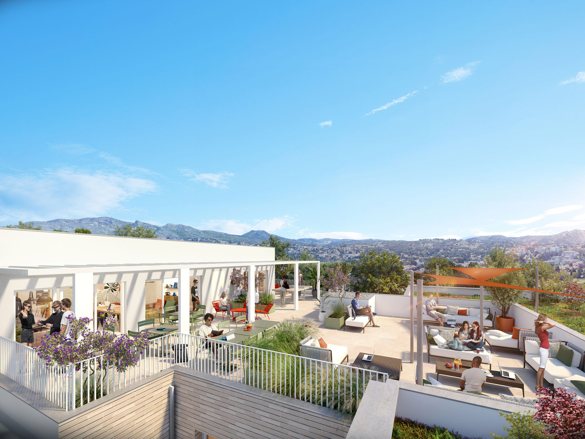 Toiture-terrasse partagée : espaces de coworking, salons extérieurs et vue sur les collines